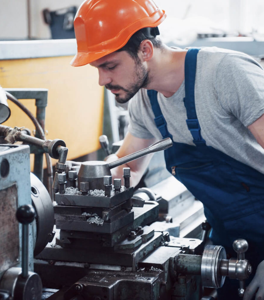 portrait-young-worker-hard-hat-large-waste-recycling-factory